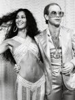 Cher and Elton John ,singers. 1975